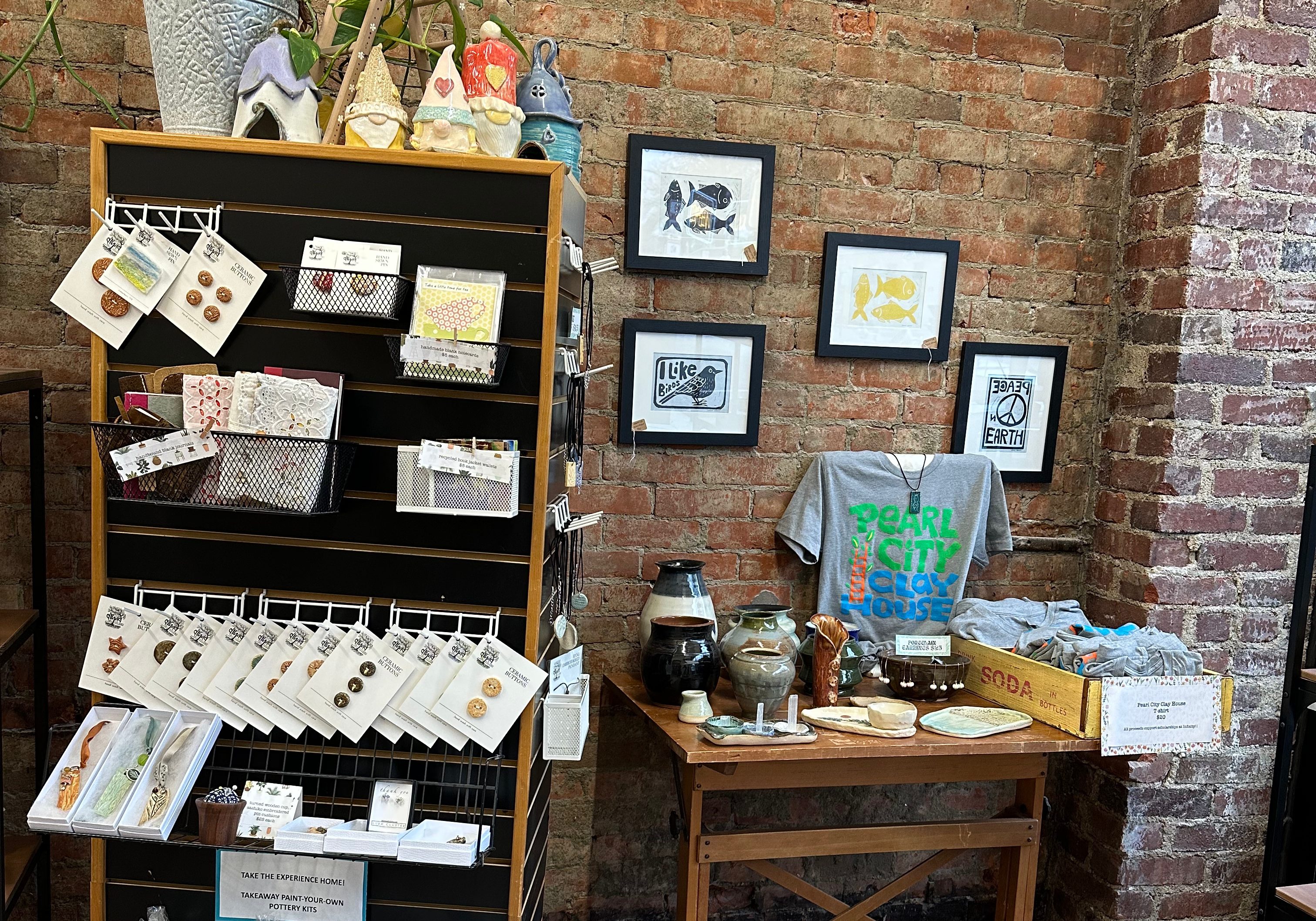 Retail shelves filled with local art for sale at Pearl City Clay House, Jamestown, NY